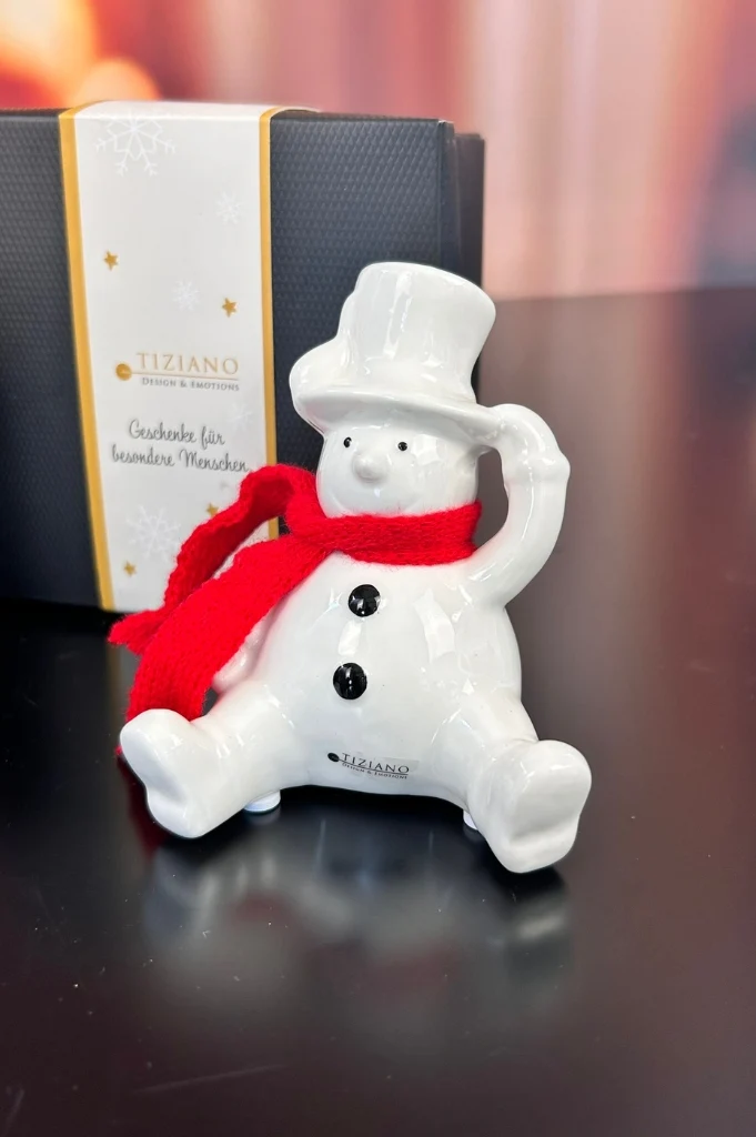 Deko Schneemann Carlo Hand an Hut in Geschenkbox
