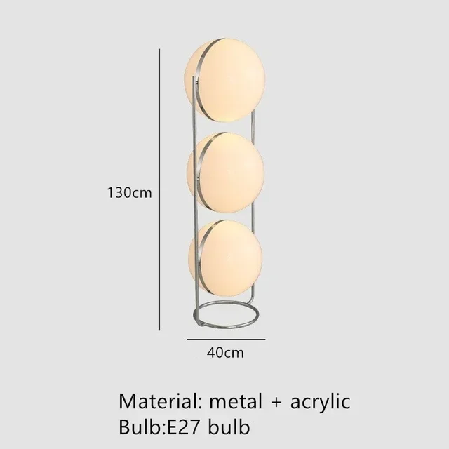 Stehlampe mit Acrylkugel und Chromständer als Designleuchte für Wohnzimmer