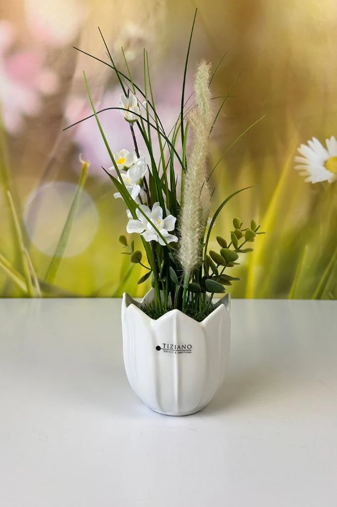 Deko Blumen farbig auf Grassockel