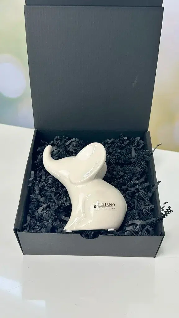 Geschenkbox Leon sitzend